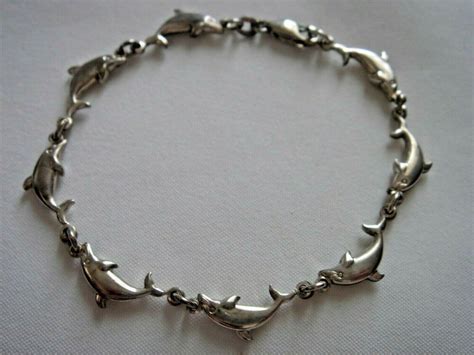 STERLING SILVER DOLPHINS BRACELET | Dolphin bracelet, Sterling silver ...