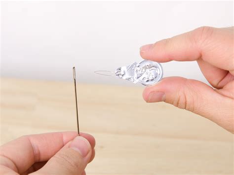 How to Use a Needle Threader - iFixit Repair Guide