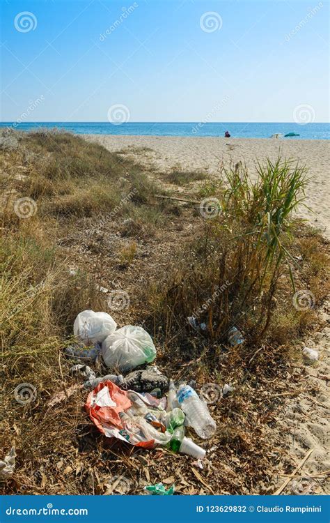 Rubbish on a beach stock photo. Image of summer, bottles - 123629832