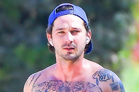 Shia LaBeouf Shows Off His Tattoos on a Run in Nike Leggings & Sleek Kicks