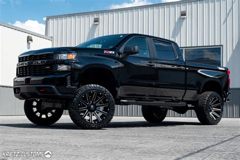 Lifted 2019 Chevrolet Silverado 1500 with 22×12 Fuel Contra Wheels and ...