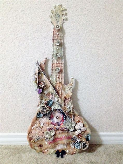 This is my musical guitar garden. I used some corn husk flowers, tong ...