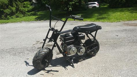 My first mini bike. The thing does wheelies. Has a predator 212 with a ...