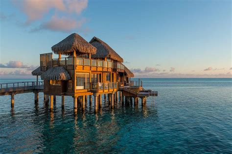 This Bora Bora Resort Has Overwater Bungalows, Exclusive Access to a ...