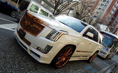 Fully Customized White Cadillac Escalade on Bronze Custom Wheels ...