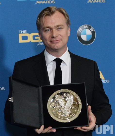 Photo: Christopher Nolan appears backstage at the 70th annual Directors ...