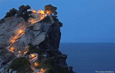 A church perched on a cliff's edge on Skopelos Island, Aegean Sea ...