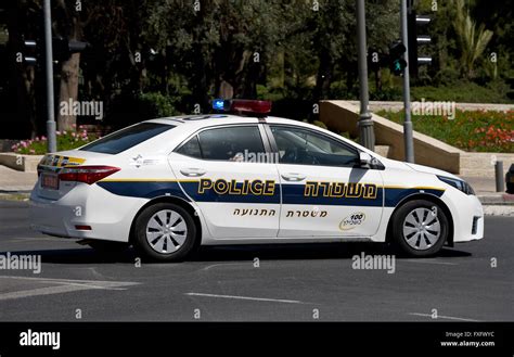 A police car driving through the old town of Jerusalem, Israel, 7 April ...