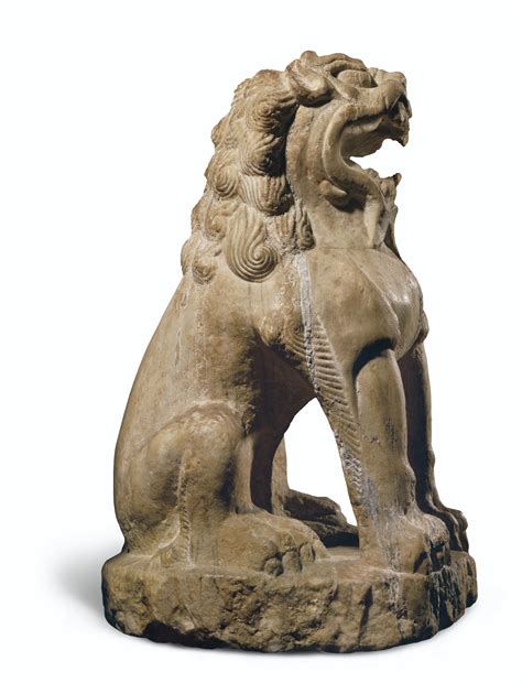 A LARGE MARBLE FIGURE OF A SEATED LION