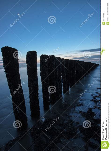 Wave breaker stock image. Image of breaker, wooden, beach - 117895005