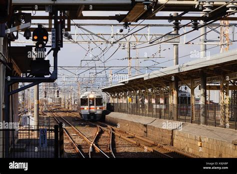 Tokyo, Japan - Dec 25, 2015. A JR train running on track and coming to ...