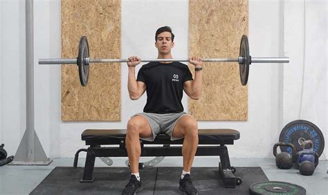 Seated Overhead Barbell Press - Tips on Proper Form and Similar Exercises