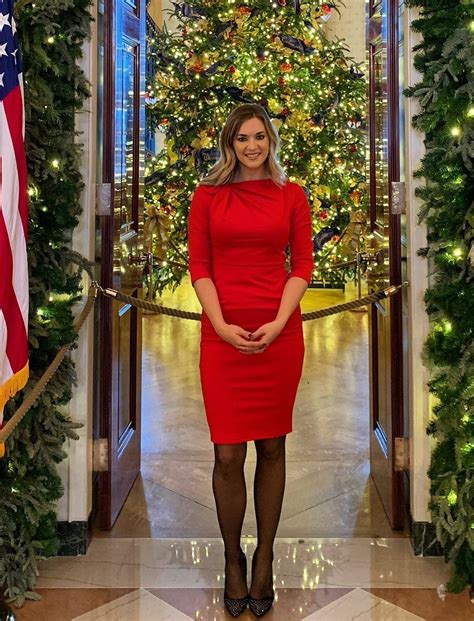 Katie Pavlich in a red dress and pumps at the White House for Christmas ...