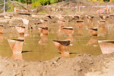 Mud Pit at a Mud Run Obstacle Course Stock Image - Image of muddy ...