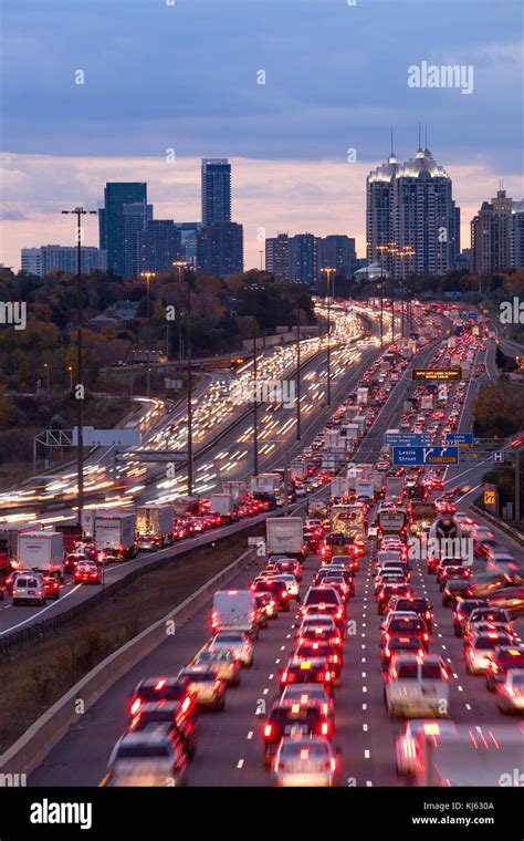 Traffic Congestion along the King's Highway 401 at sunset in Toronto ...