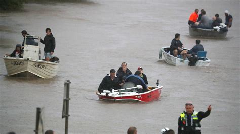 Australia's flooding death toll increases to 12 after man's body found ...