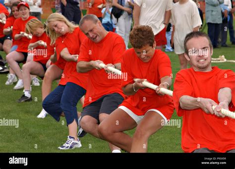 A game of tug of war played by competing teams outdoors Stock Photo - Alamy