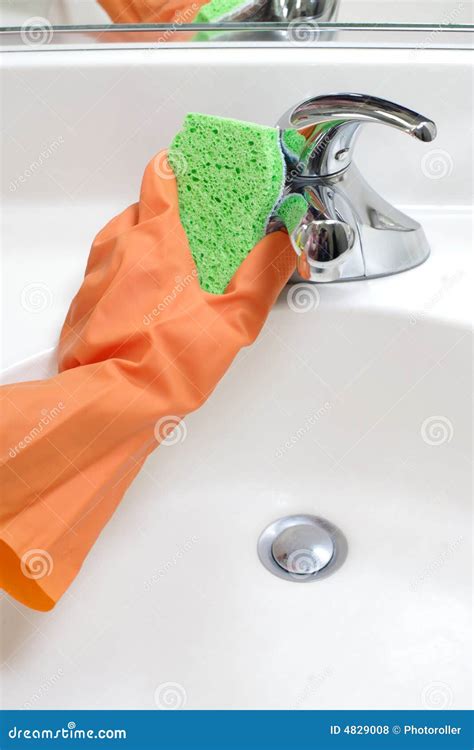 Cleaning Bathroom Sink stock photo. Image of cleaning - 4829008