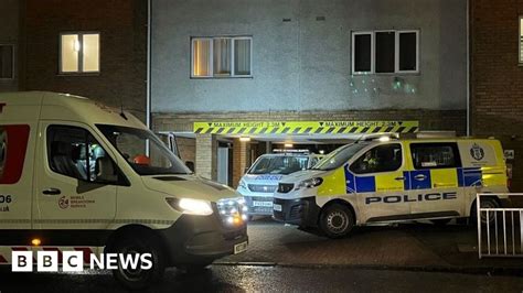 Man and woman arrested over death in Glasgow flat