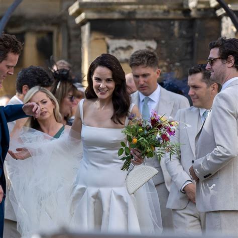 Downton Abbey star Michelle Dockery stuns in satin white gown as she ...