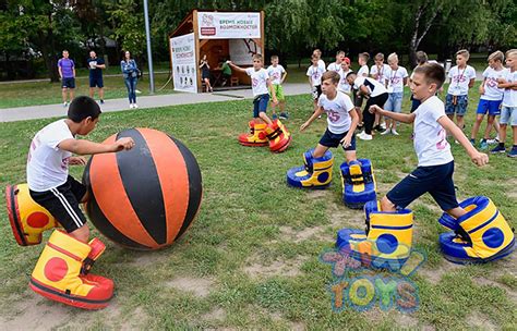 These Giant Inflatable Bouncy Shoes Will Make Giant Soccer Games Extra Fun