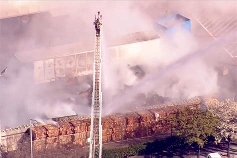 Tesla factory fire in Fremont, California - Firefighters battle massive ...