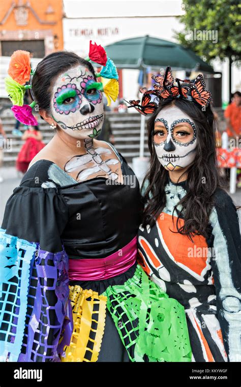 Young Mexican women dressed in La Calavera Catrina costume for the ...