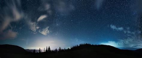 Free Photo | Mountain forest under beautiful night sky with stars