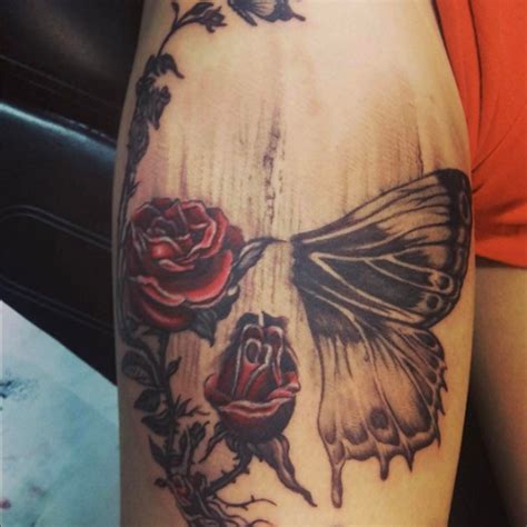 Hidden skull in roses and butterfly by Johnny @yiannidrakakidis #tattoo ...