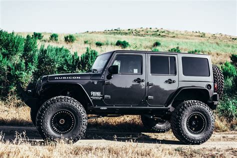 Perfect Fitment of Nitto Tires on Custom Black Lifted Jeep Wrangler ...