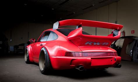 Red RWB Porsche 930 Turbo | Porsche sports car, Porsche 964, Sport cars