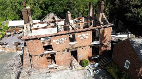 Dudley teacher recreates Crooked House pub using Lego - BBC News