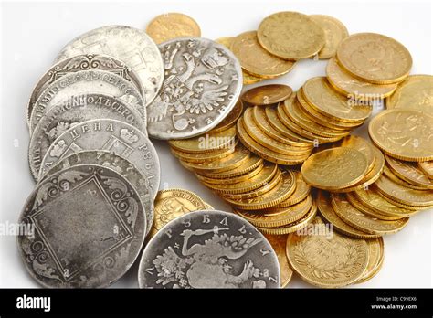 silver and gold coins Stock Photo - Alamy