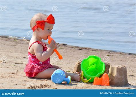 Girl with beach toys stock photo. Image of vacation, child - 59914794