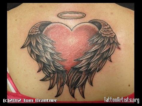 heart shaped angel wings tattoo | Angel Heart Tribal Tattoos, Feather ...