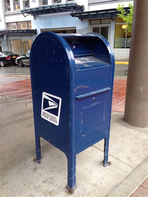 A blue US Mail post box in Juneau, Alaska.