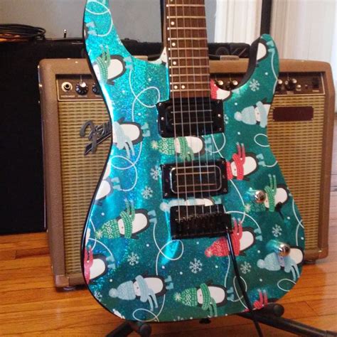 Anyone tried Christmas wrapping a guitar? : r/guitars