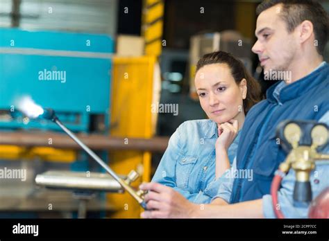 demonstrating the welding rod uses Stock Photo - Alamy