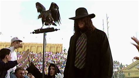 The Undertaker makes an ominous entrance at WrestleMania IX: Clothes ...