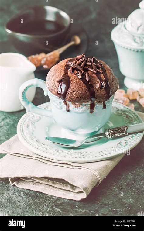 Chocolate souffle with sauce Stock Photo - Alamy