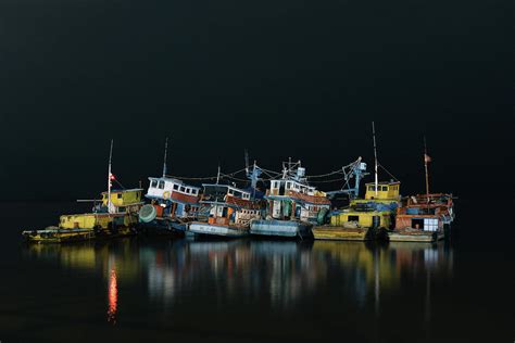 Fishing Boats at Night Photograph by Lam Bui