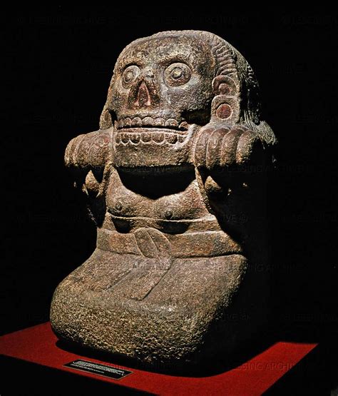 Ancient Aztec sculpture of Tlatecuhile (Lord of the Earth). Limestone ...