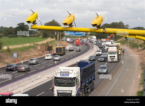 Average speed cameras on the M6 motorway in Cheshire,UK Stock Photo - Alamy