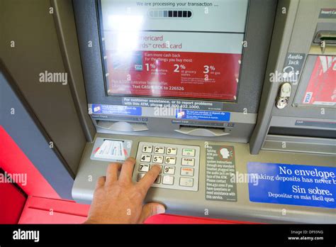 Using keypad on Bank of America ATM - USA Stock Photo - Alamy