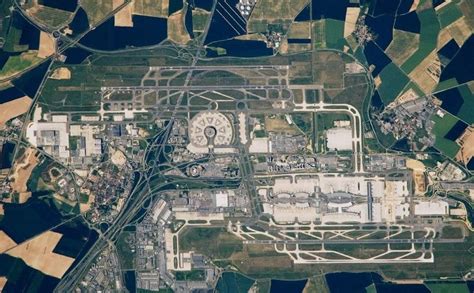 France to reevaluate construction of fourth terminal at Charles de ...