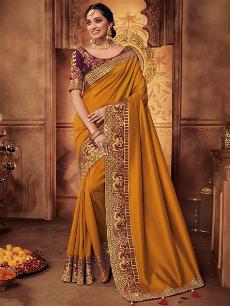 Mustard Silk Plain Saree with Peacock Motif Embroidered Border in 2020 ...