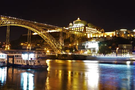 The Douro River in Porto and Dom Luis I Bridge at night - Our Big Fat ...