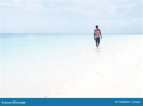 Black African Young Man Walking on Tropical Beach Stock Image - Image ...