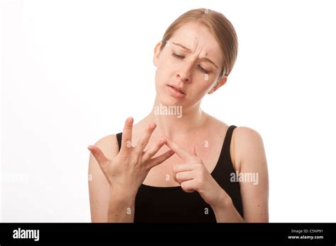 a young caucasian woman counting on the fingers of one hand Stock Photo ...