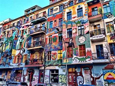 A colorful row of buildings in the Friedrichshain neighborhood in ...